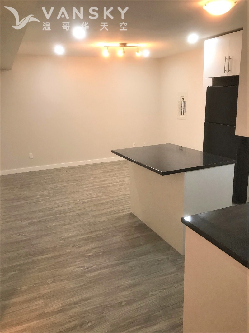 250901214245_2. Basement Living Room.jpg